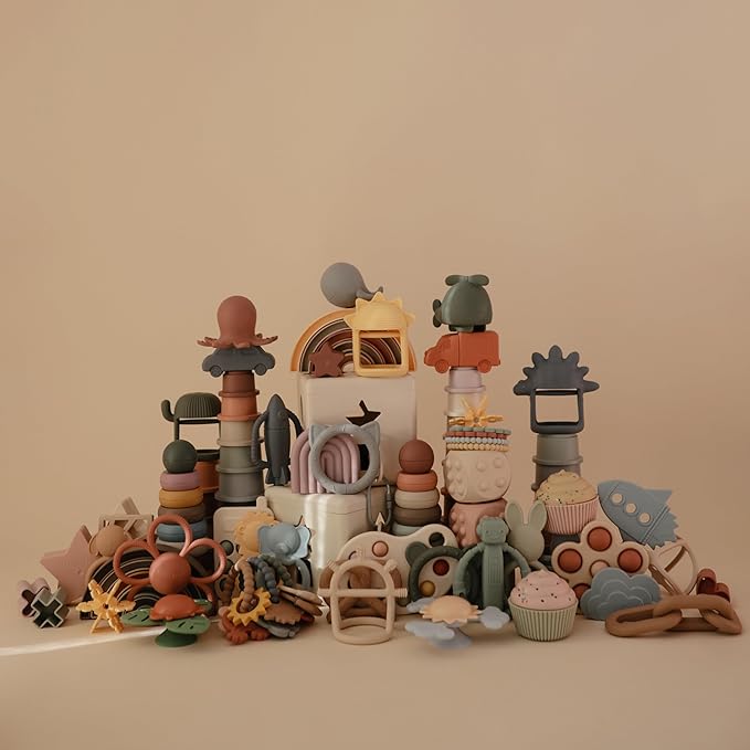 mushie Silicone Baby No-Drop Dino Teether Toy