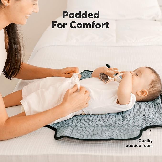 KeaBabies Portable Diaper Changing Pad - Large Waterproof Baby Changing Mat, Compact Travel Diaper Clutch, Functional Pockets Fit Newborn Essentials, Wipeable & Padded Baby Changer (Black Geo)