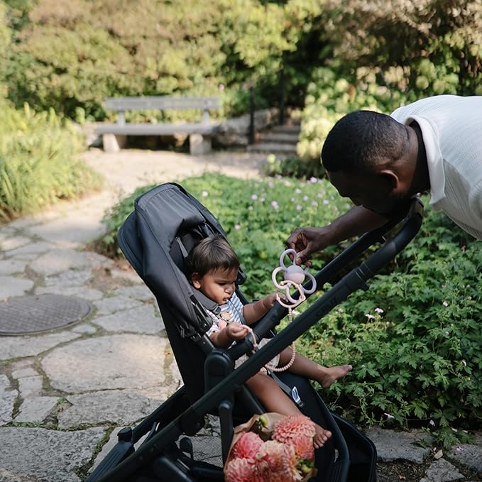 mushie Silicone Baby Daisy Rattle Teether Toy (Soft Lilac)