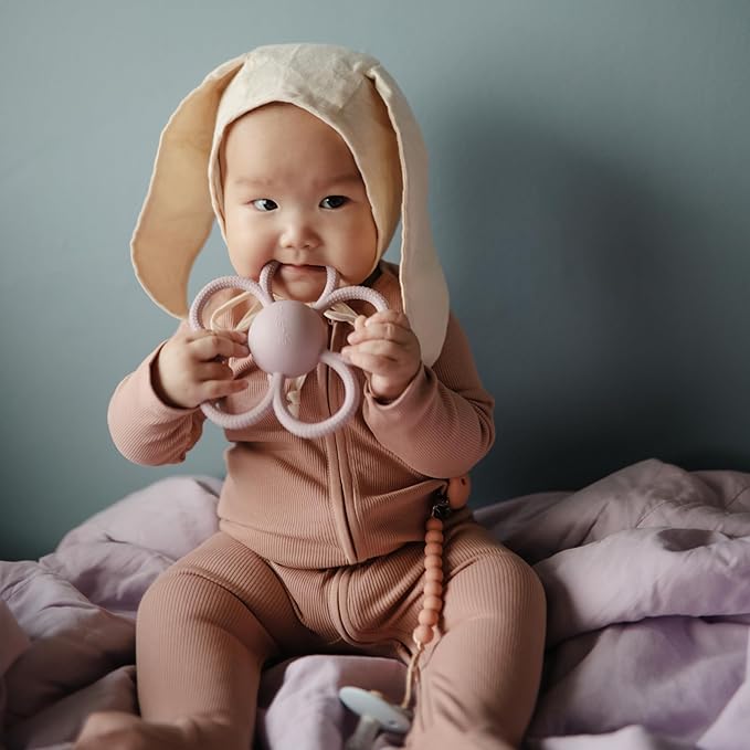 mushie Silicone Baby Daisy Rattle Teether Toy (Soft Lilac)