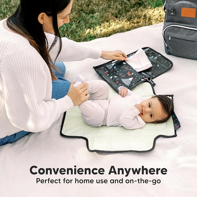 KeaBabies Portable Diaper Changing Pad - Large Waterproof Baby Changing Mat, Compact Travel Diaper Clutch, Functional Pockets Fit Newborn Essentials, Wipeable & Padded Baby Changer (Fox Vale)