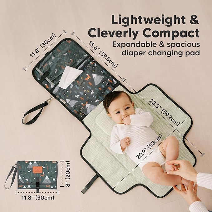KeaBabies Portable Diaper Changing Pad - Large Waterproof Baby Changing Mat, Compact Travel Diaper Clutch, Functional Pockets Fit Newborn Essentials, Wipeable & Padded Baby Changer (Woods)