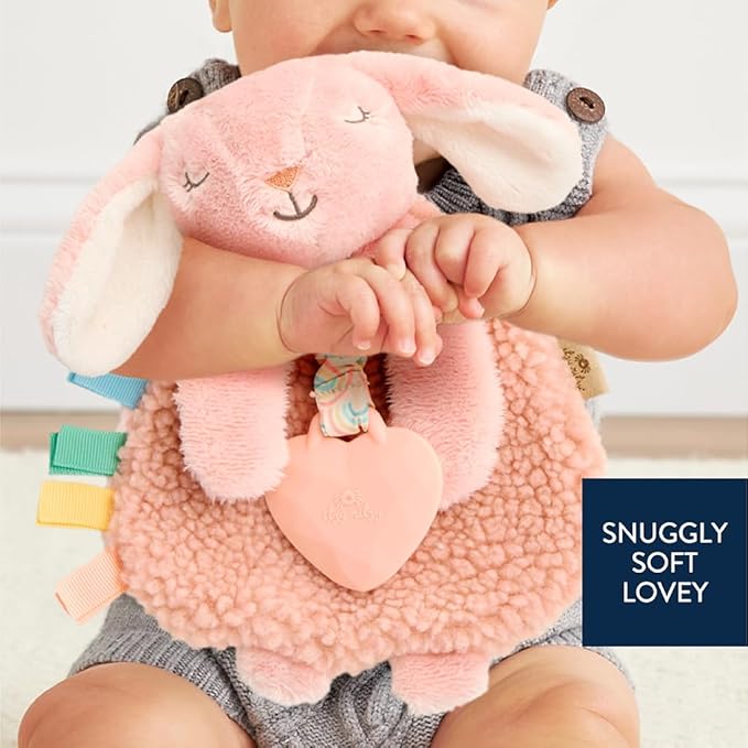 Itzy Ritzy - Itzy Lovey Including Teether - Baby Lovey with Teether, Textured Ribbons & Dangle Arms - Features Crinkle Sound, Sherpa Fabric and Minky Plush (Pink Bunny)