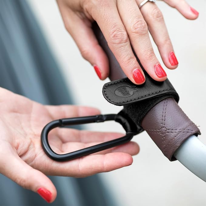 Baby Uma Stroller Hooks for Bags (2 Pack) - Faux-Leather Stroller Clips and Hooks, Universal, 11 lb Weight Capacity per Carabiner, Adjustable & Non-Slip, Baby Travel Essential (Black)