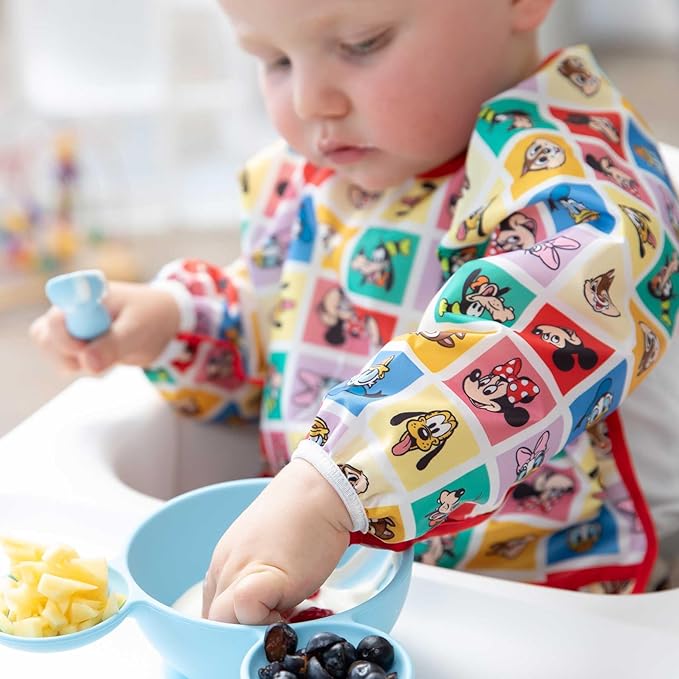 Bumkins Disney Sleeved Bib for Girl or Boy, Baby and Toddler for 6-24 Mos, Essential Must Have for Eating, Feeding, Baby Led Weaning Supplies, Long Sleeve Mess Saving, Mickey and Friends Check Mates