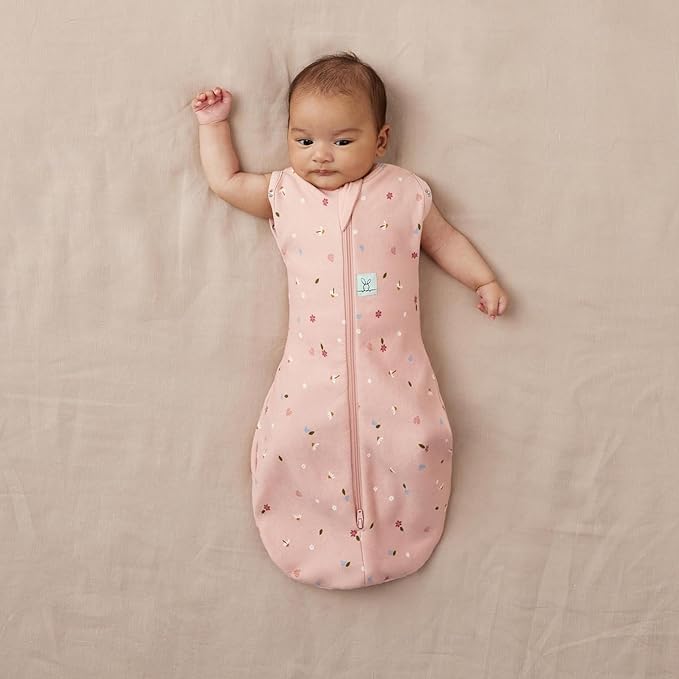 ergoPouch Cocoon Swaddle Sack 0.2 TOG - Baby Sleep Sack, Gentle Snug Fit Helps Calm Startle Reflex, Ideal for Arms In/Out Sleeping, Soft Breathable Fabric for Better Sleep (0 Months, Daisies)