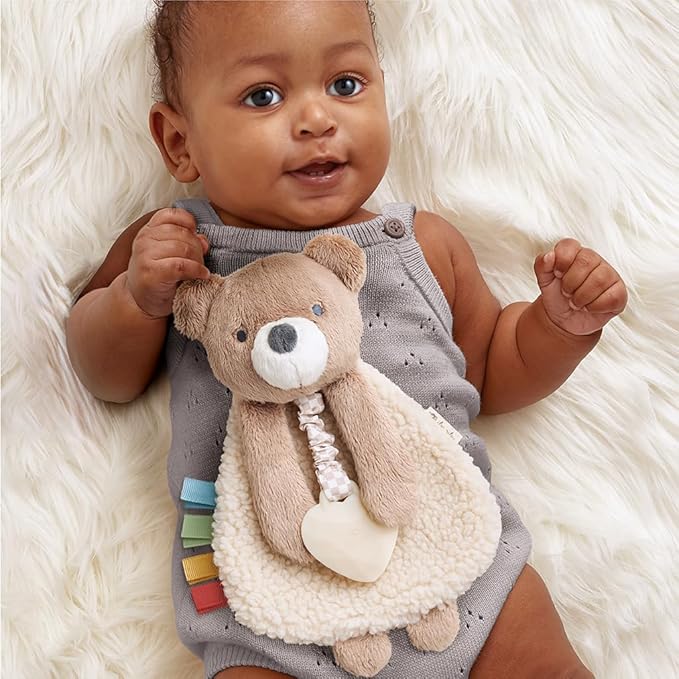Itzy Ritzy - Itzy Lovey Including Teether - Baby Lovey with Teether, Textured Ribbons & Dangle Arms - Features Crinkle Sound, Sherpa Fabric and Minky Plush (Bear)
