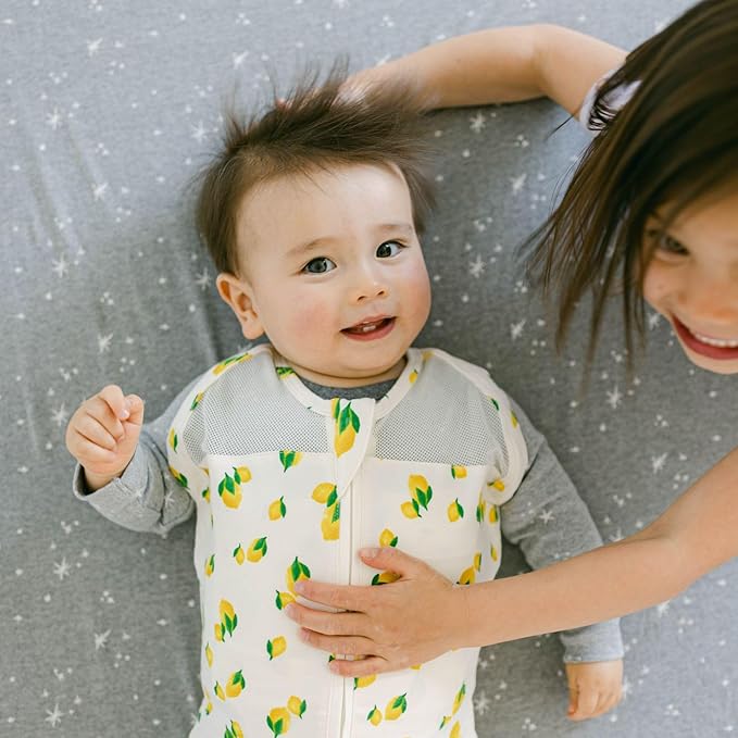 Happiest Baby Sleepea 5-Second Swaddle - 100% Organic Cotton Baby Swaddle Blanket - Doctor Designed Promotes Healthy Hip Development (Ivory Lemons, Small)