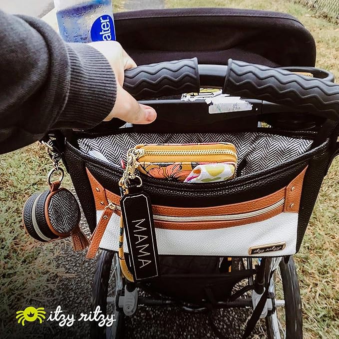 Itzy Ritzy Adjustable Stroller Caddy and Organizer Bag Featuring Front Zippered Pocket, 2 Built-In Interior Pockets & Adjustable Straps to Fit Nearly Any Stroller (Coffee and Cream)