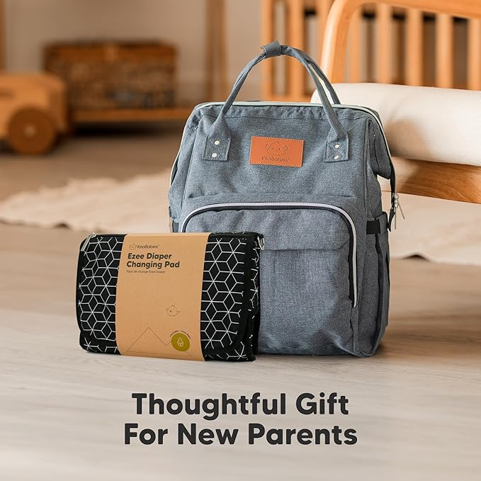 KeaBabies Portable Diaper Changing Pad - Large Waterproof Baby Changing Mat, Compact Travel Diaper Clutch, Functional Pockets Fit Newborn Essentials, Wipeable & Padded Baby Changer (Pets & Paws)