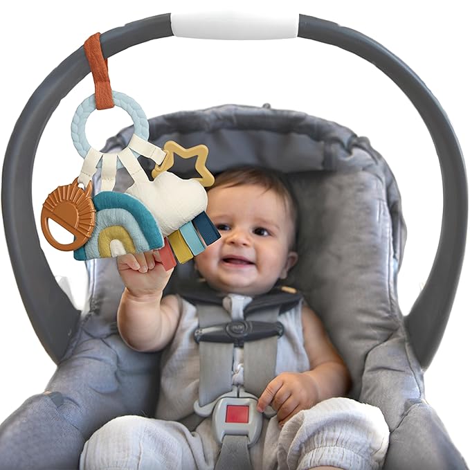Itzy Ritzy Teething Activity Toy - Bitzy Busy Ring Infant Teething Toy Features Braided Ring & Dangling Toys, Includes Teether, Textured Ribbons, Crinkle Sound & Jingle Bell - 0 Months & Up (Rainbow)