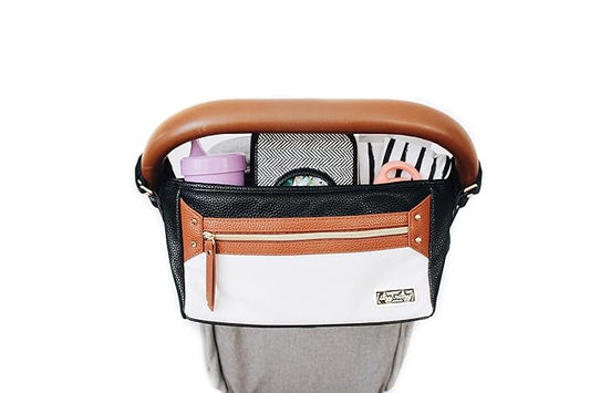 Itzy Ritzy Adjustable Stroller Caddy and Organizer Bag Featuring Front Zippered Pocket, 2 Built-In Interior Pockets & Adjustable Straps to Fit Nearly Any Stroller (Coffee and Cream)