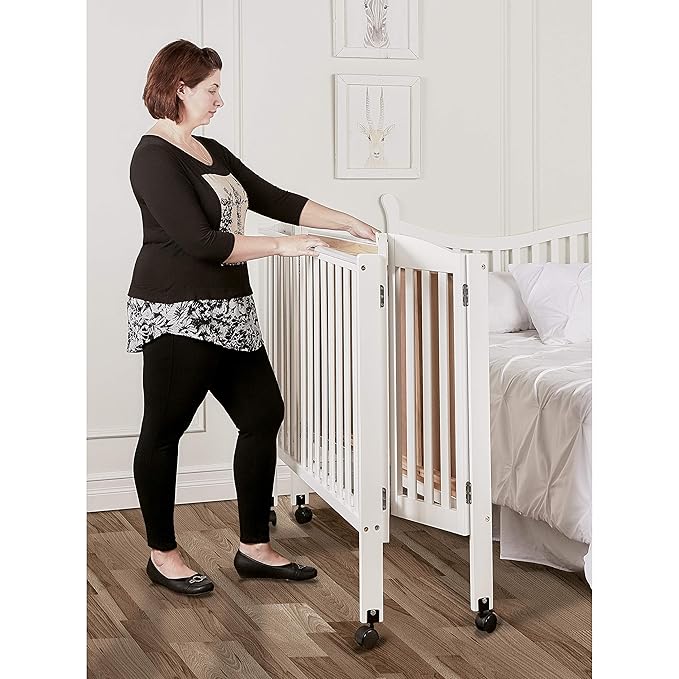 Dream On Me 3-in-1 Portable Folding Stationary Side Mini Baby Crib in White & Mattress, GreenGuard Gold & JPMA, Use as Changer & Playpen, Locking Wheels, 3 Mattress Heights, Extra Firm Mattress