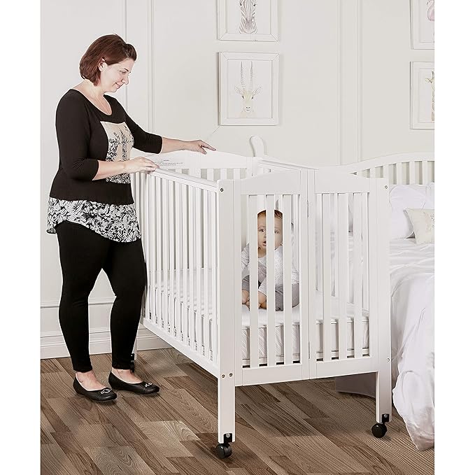 Dream On Me 3-in-1 Portable Folding Stationary Side Mini Baby Crib in White & Mattress, GreenGuard Gold & JPMA, Use as Changer & Playpen, Locking Wheels, 3 Mattress Heights, Extra Firm Mattress