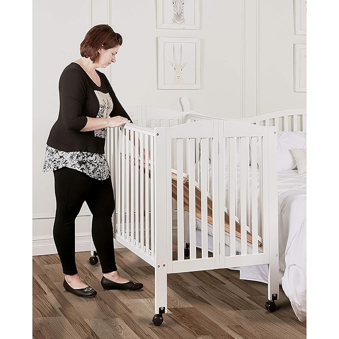 Dream On Me 3-in-1 Portable Folding Stationary Side Mini Baby Crib in White & Mattress, GreenGuard Gold & JPMA, Use as Changer & Playpen, Locking Wheels, 3 Mattress Heights, Extra Firm Mattress