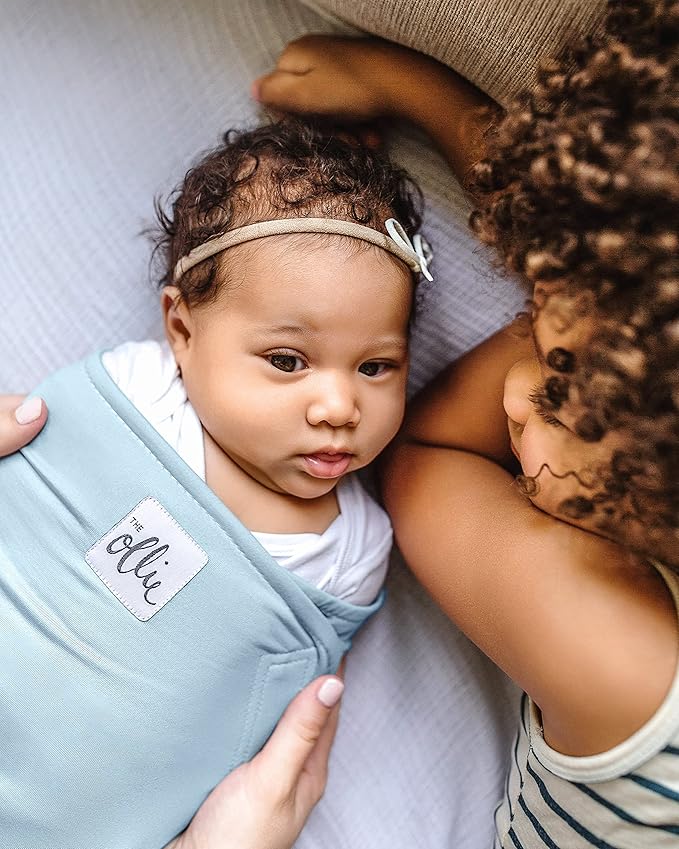 The Ollie Swaddle – Adjustable Baby Swaddle for Newborns | Pediatrician-Approved for Safe Sleep | Easy Closure | Arms-Out | Lightweight, Machine-Washable | Easy Diaper Access